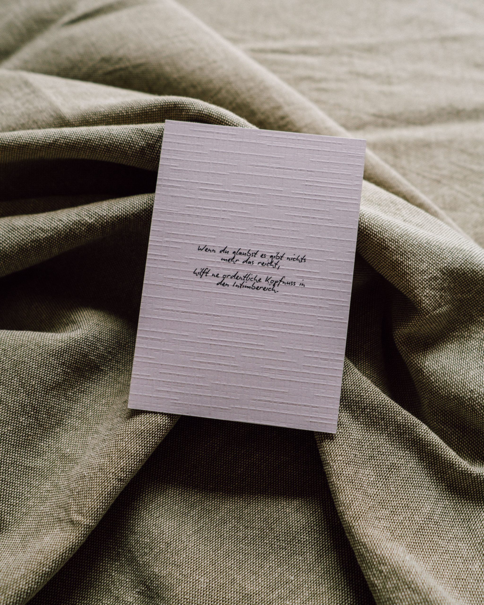 Postkarte „Eine ordentliche Kopfnuss" – Spruch